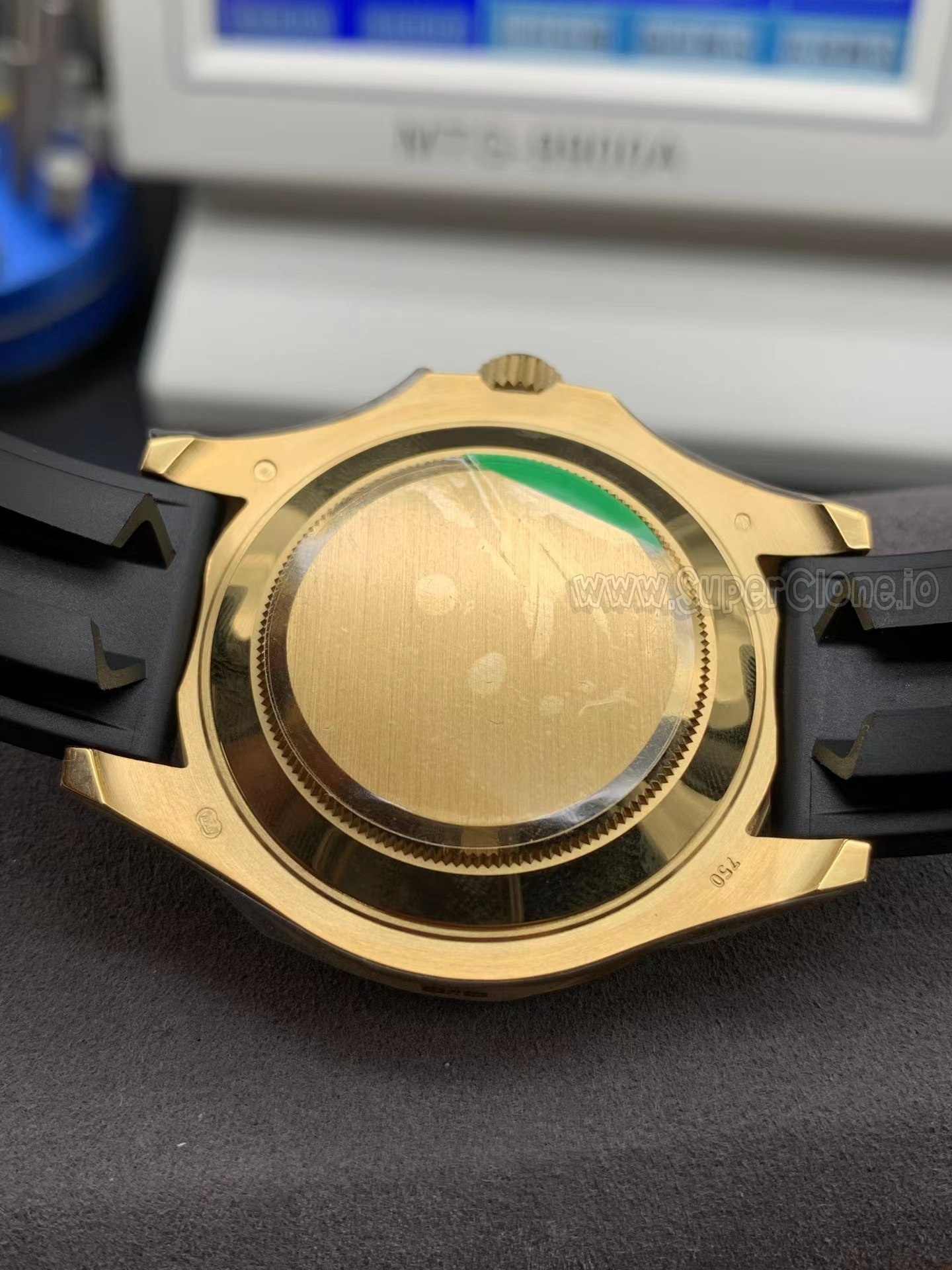 Case back and hallmarks of the gold clone