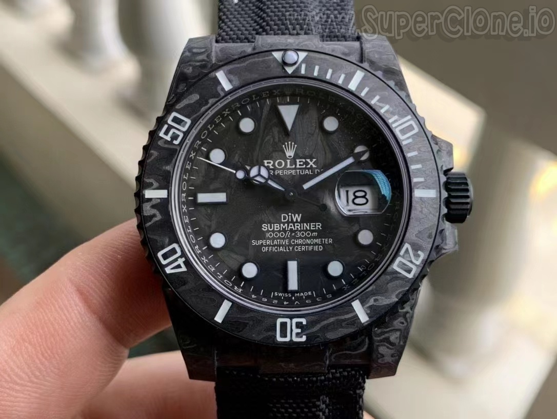 Detailed layout of hour markers and hands against the forged carbon dial backdrop