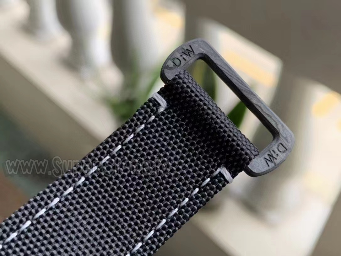 Macro photo of the milled forged carbon buckle texture