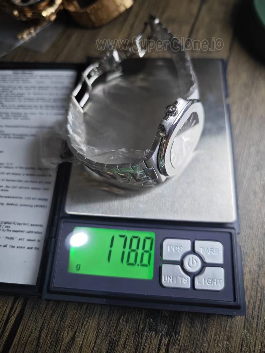 Full view of custom white gold 5811G piece
